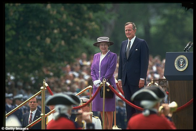 President George HW Bush (right) and Queen Elizabeth (left) pose for photos on the South Lawn of the White House during the Queen's state visit to Washington, D.C. in 1991