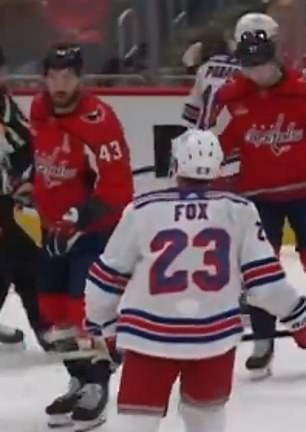 Adam Fox stares at Tom Wilson