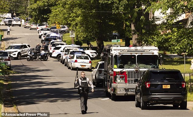 A woman and a 17-year-old man were found in the house after a three-hour standoff, during which armored vehicles crashed into the house in the suburbs