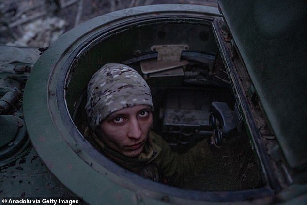 A Ukrainian soldier is seen as Ukrainian soldiers of the 80th Brigade move along the front line