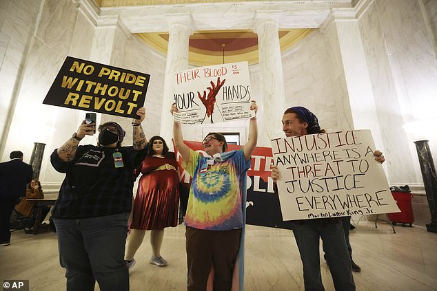 An appeals court has ruled that West Virginia's transgender sports ban violates the 13-year-old athlete's rights under Title IX (Photo: A protest at the state capitol in Charleston in 2023)