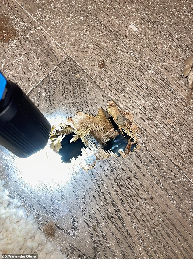 The space debris crashed through Alejandro Otero's roof and went through his floor (pictured) into the basement below.