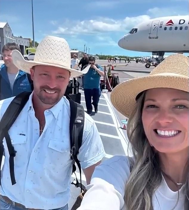 Ryan Watson and his wife Valerie (pictured arriving together on their Turks and Caicos holiday) were arrested on April 11 after Turks and Caicos airport staff found ammunition in Ryan's luggage