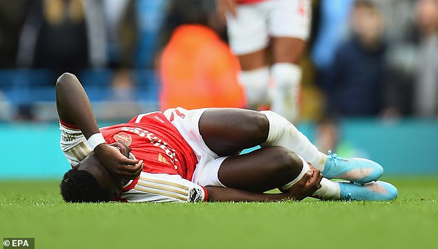 Bukayo Saka limped off after going down injured in Arsenal's goalless draw with Man City