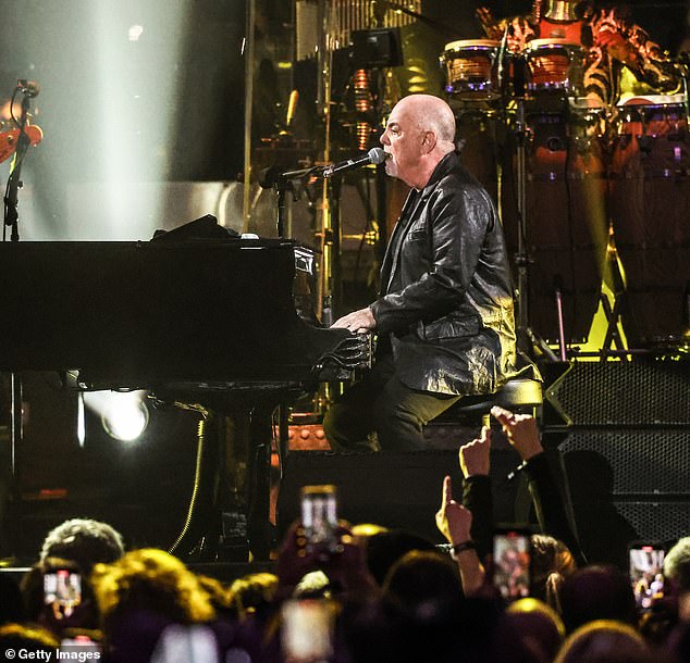 Billy Joel fans have criticized CBS for cutting the legendary singer-songwriter during his most iconic song, Piano Man, at the end of their broadcast special of his 100th consecutive performance at Madison Square Garden (pictured)