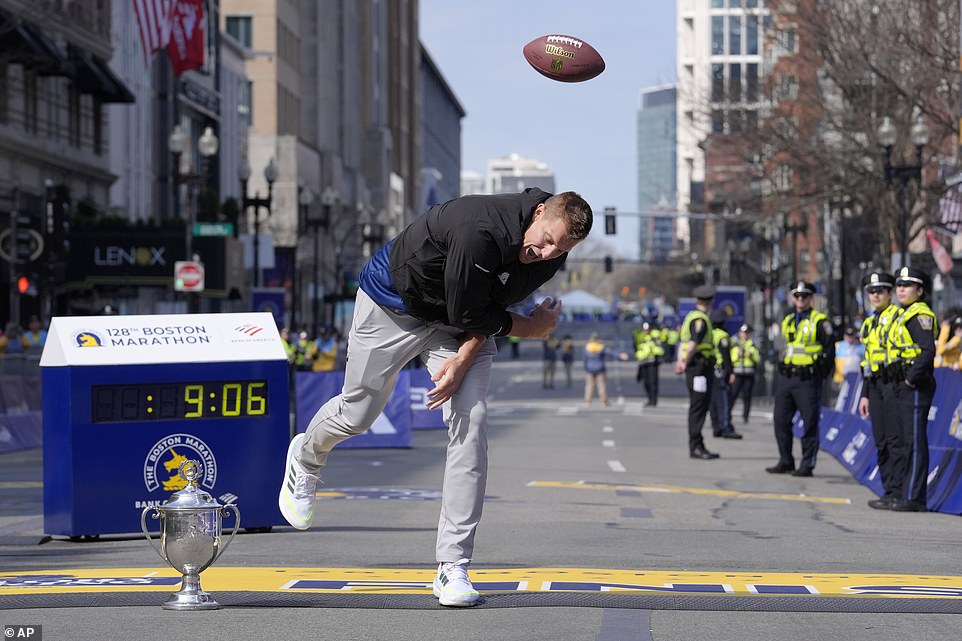 At the end of the world's oldest and most prestigious annual marathon, former NFL tight end Rob Gronkowski was waiting