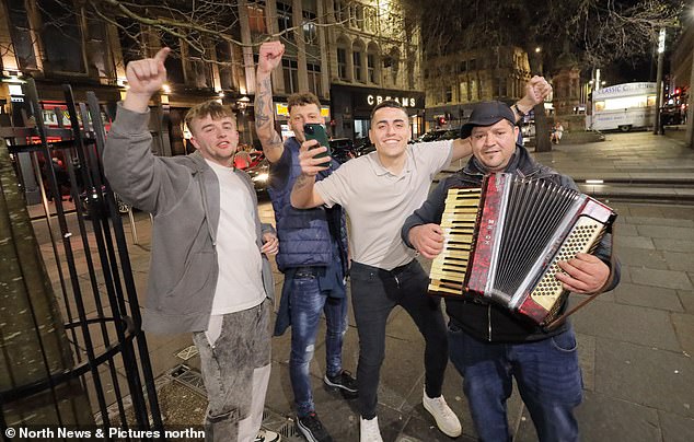 This group of boys stopped to dance with a man playing the accordion in Newcastle