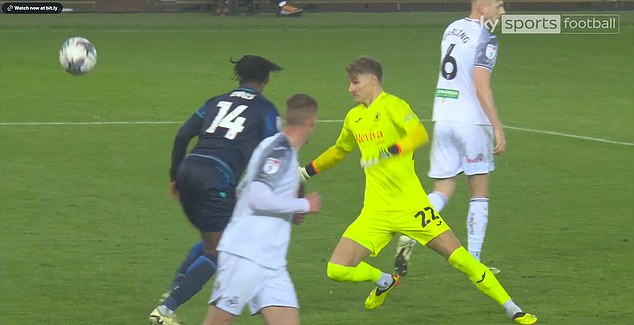 Swansea goalkeeper Carl Rushworth accidentally bounced the ball off the back of the head of Stoke striker Niall Ennis