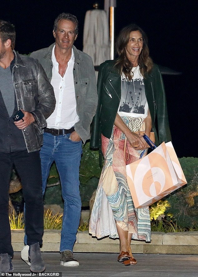 Cindy Crawford was a vision of style for dinner at A-list-approved restaurant Nobu Malibu with her husband Rande Gerber on Tuesday night