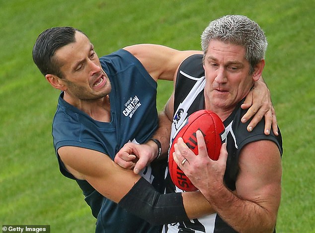 Gavin Crosesca (right) battled drug addiction for 25 years in the AFL as a player and coach