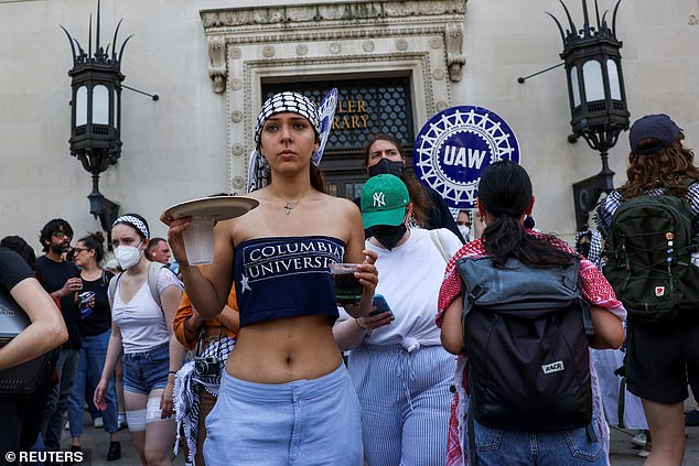 Students gather to march and protest in support of a campus protest encampment supporting Palestinians, despite a 2 p.m. deadline set by university officials to disband