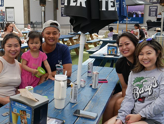 Kimberly Nguyen and her husband Luan brought their daughter Emma (left) to view the eclipse, along with their sister Cindy Nguyen (front right) and her friend Lily Dran (back right) who traveled from Toronto, Ontario to view the eclipse