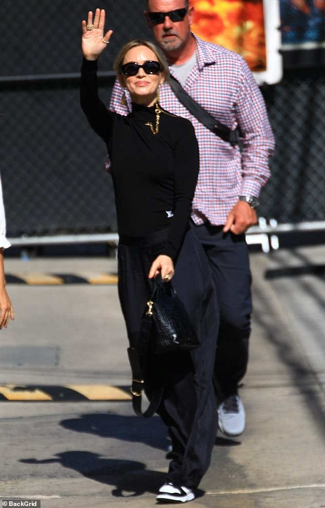 Emily Blunt smiled and waved to fans on Monday as she arrived for her Jimmy Kimmel Live!  appearance in Hollywood