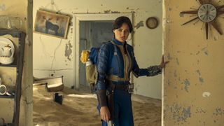 Lucy explores an abandoned, destroyed house in Amazon's Fallout TV series