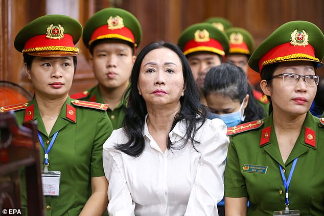 Truong My Lan (C), chairman of Van Thinh Phat Holdings, sits during her trial at the Ho Chi Minh City People's Court