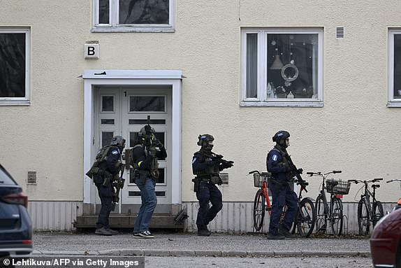 Finnish police investigate the scene at Viertola primary school where a child opened fire and injured three other children on April 2, 2024 in Vantaa, outside the Finnish capital Helsinki.  Police said the attacker was in custody, and 