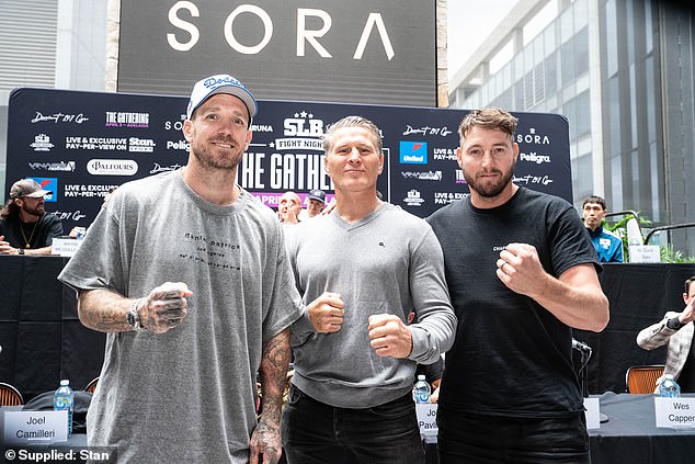 Dane Swan (left) prepares for his debut boxing fight with former AFL star Dale Thomas (right; former Aussie world champion Danny Green, center)
