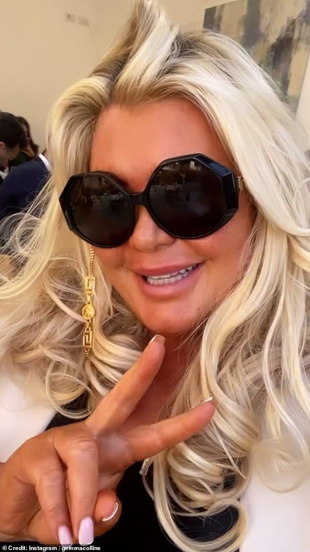 During the clip, the TOWIE icon, 43, appeared in good spirits as she filmed herself in a restaurant sipping a glass of white wine