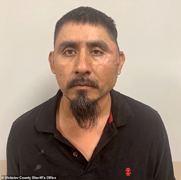 Adan Tzoyohua Panzo, 36, was charged with murder, malice murder and arson, according to the Georgia Bureau of Investigation.