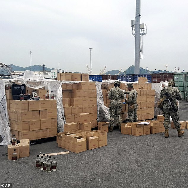 The Mexican Navy found 7,200 bottles of liquid labeled mezcal in August last year that actually contained liquid meth and were on their way to Australia (pictured)