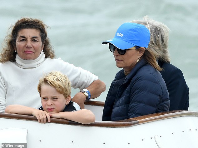 Carole, right, watches over her grandson, Prince George, during the King's Cup Regatta in Cowes in 2019