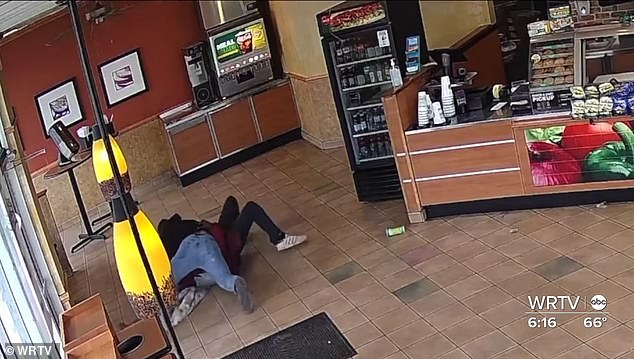 Pitzulo, who now works as a welder, quickly tackled the attacker and pinned him to the ground, as seen on surveillance footage.