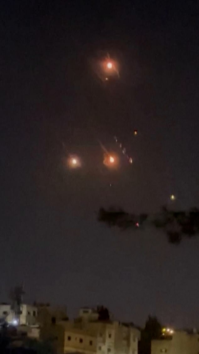 Missiles beginning to enter Israeli airspace were seen in a video shared with MailOnline