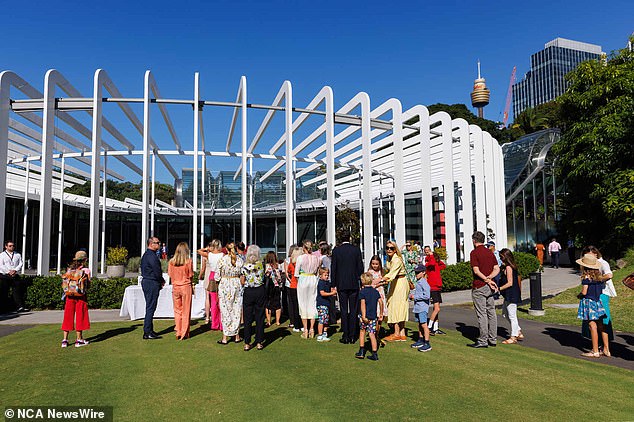 Mourners gather at Sydney Botanic Gardens for a memorial service for Bondi stabbing victim Jade Young