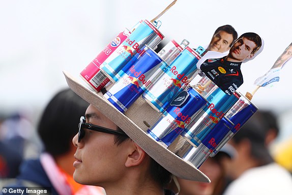 SUZUKA, JAPAN – APRIL 06: Max Verstappen of the Netherlands and Oracle Red Bull Racing show their support with a hat made from Red Bull cans prior to qualifying ahead of the F1 Grand Prix of Japan at Suzuka International Racing Course on April 6, 2024 in Suzuka, Japan.  (Photo by Peter Fox/Getty Images)