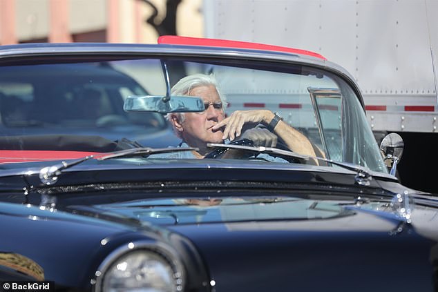 Jay Leno was spotted driving around Los Angeles in his vintage 1957 Buick Roadmaster - a day after he was officially granted the conservatorship by his wife Mavis Leno