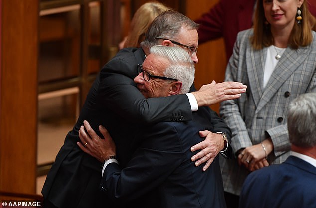 One of Anthony Albanese's closest friends in politics has blamed Labor's pro-landlord policies for Australia's housing crisis (the Labor leader is pictured hugging former senator Doug Cameron in April 2019)