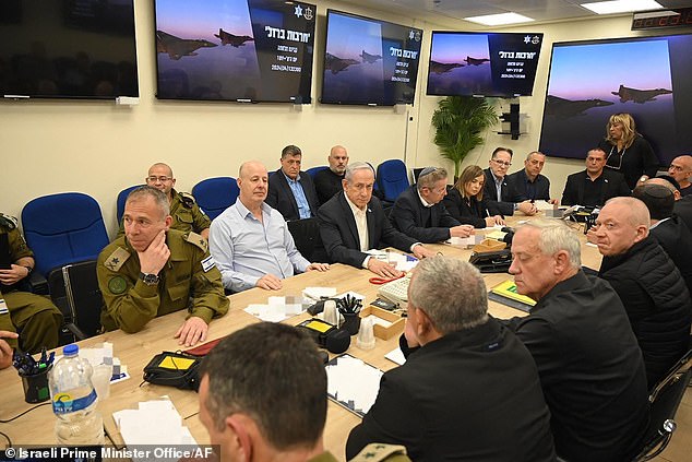 Israeli Prime Minister Benjamin Netanyahu (C) during a war cabinet meeting in Tel Aviv's Kirya