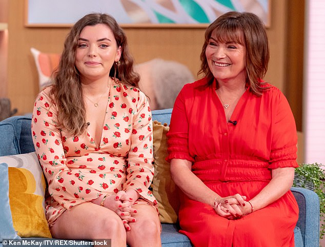 On Friday, Lorraine Kelly's only daughter Rosie cradled her growing bump as she revealed she was 12 weeks along (pictured together in May 2021)
