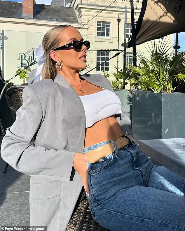 Faye Winter showed off her incredible figure in a white crop top as she enjoyed an outdoor lunch over the Easter holidays