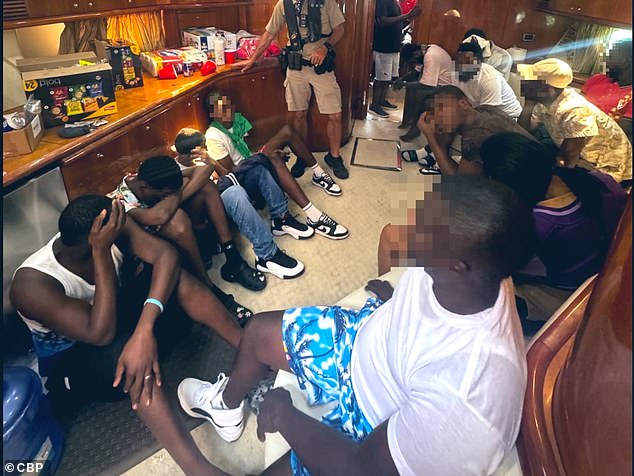 Border Patrol released an image of the migrants, mostly men, crammed below deck into the yacht's interior