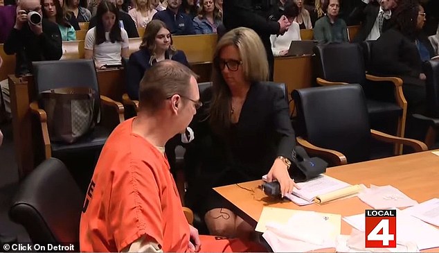 James Crumbley was the first to enter the courtroom wearing an all-orange jumpsuit ahead of his sentencing on Tuesday