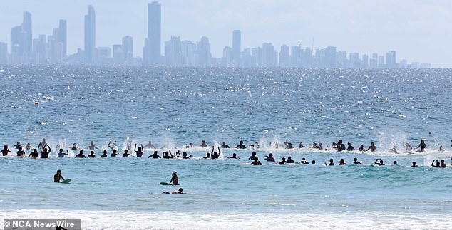 Hundreds of people (pictured) turned out at Greenmount Beach Surf Club on the Gold Coast to celebrate the life of Ed Fanning