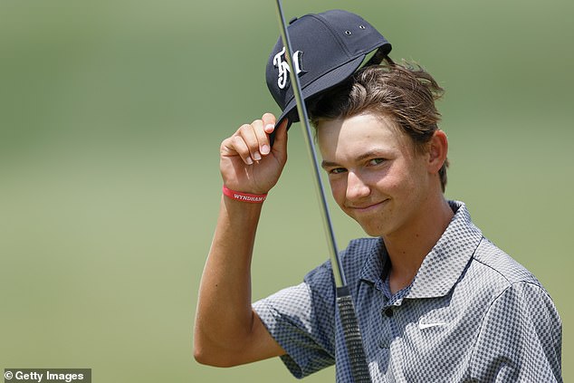 Miles Russell of the United States reacts on the 18th green of Lakewood National Golf Club