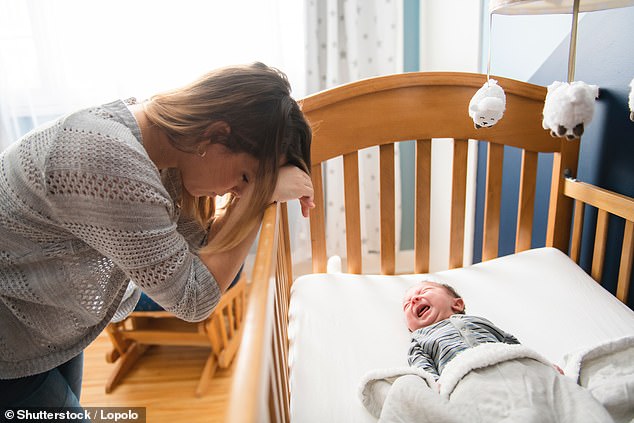 A woman revealed on Mumsnet that her childless neighbor complained because her sick nine-month-old daughter wouldn't stop crying (stock image)