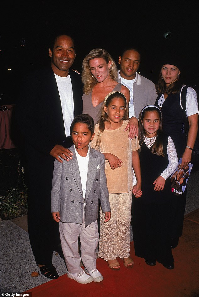 OJ Simpson pictured with his ex-wife Nicole and their blended family at the 1994 premiere of Naked Gun 33 1/3, just three months before her murder