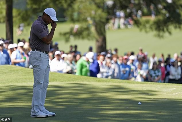 Tiger Woods' longest day at Augusta National was a battle between light and darkness