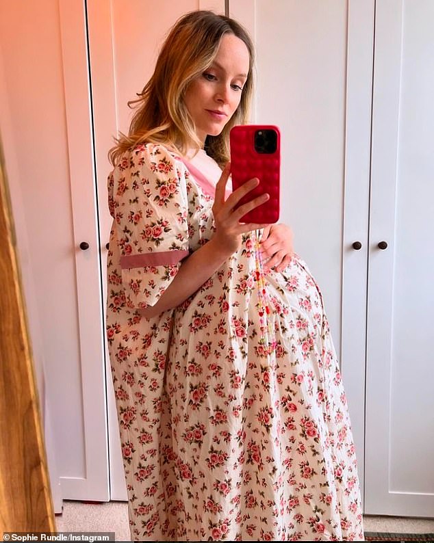Peaky Blinders star Sophie Rundle cradled her blossoming baby bump as she took to Instagram on Friday to share a belly update after revealing she's expecting her second child