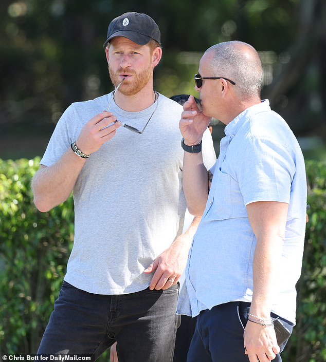 The Prince cut a demure figure in black jeans and a gray T-shirt, but his arrival was betrayed by a Netflix film crew who were on hand to capture his interactions with the impressed players.