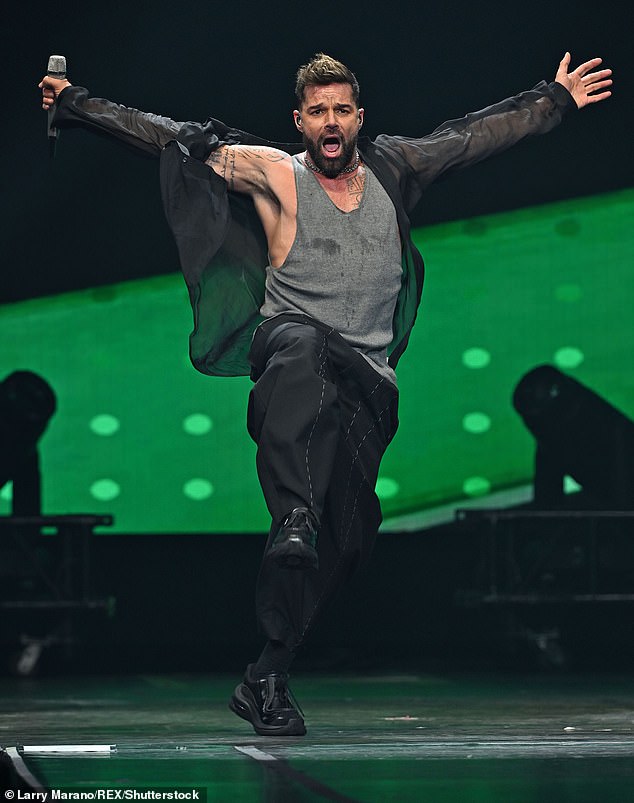 Ricky Martin lived la vida loca at Madonna's concert in Miami on Sunday;  seen in March