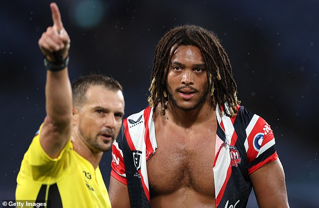 The Roosters' Dominic Young is sent off by referee Grant Atkins after a high tackle on the Bulldogs' Blake Taaffe