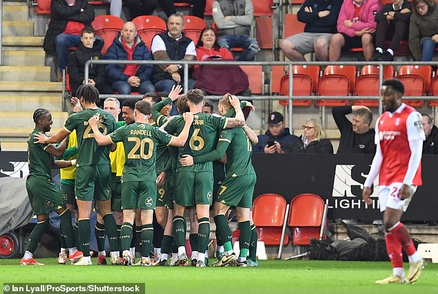 Bali Mumba (left) scored his 10th career goal in the 32nd minute to give Plymouth Argyle a huge boost in their quest for survival