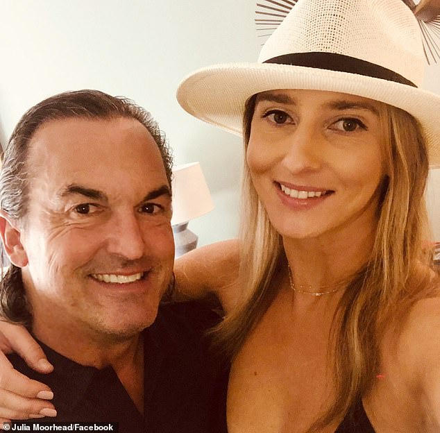 Wealthy hotel guest Julia ReJean Moorhead was seen on camera attacking police officers who were called to remove her for 'causing a disturbance' at a luxury hotel.  Pictured: Moorhead and her boyfriend