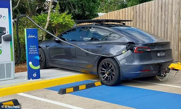 The image shared on social media showed the Tesla well outside the boundaries of the bay, with most of the car climbing the front curb.