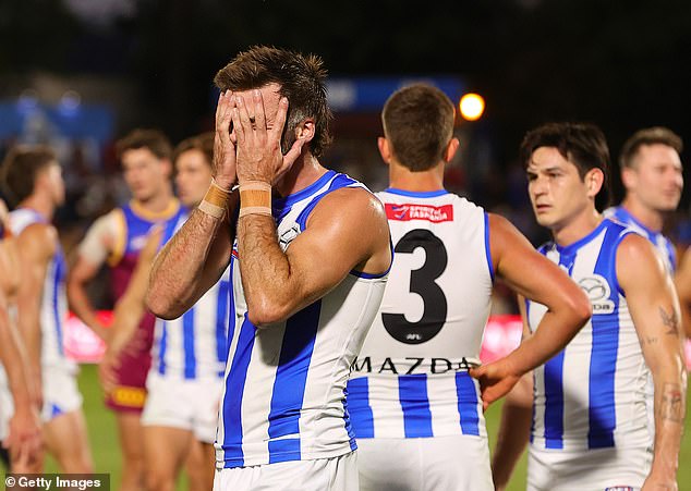 Hood received waves of abusive messages from fans as the Kangaroos lost four games in a row this AFL season (Photo: Luke McDonald after a 70-point loss to the Lions)