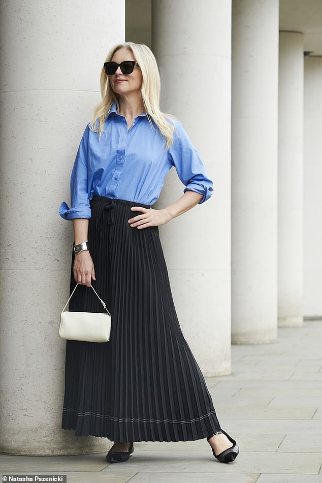 Joanne Hegarty Wears Shirt (Arket);  skirt (Massimo Dutti);  bag, (The Row) and shoes (Chanel)